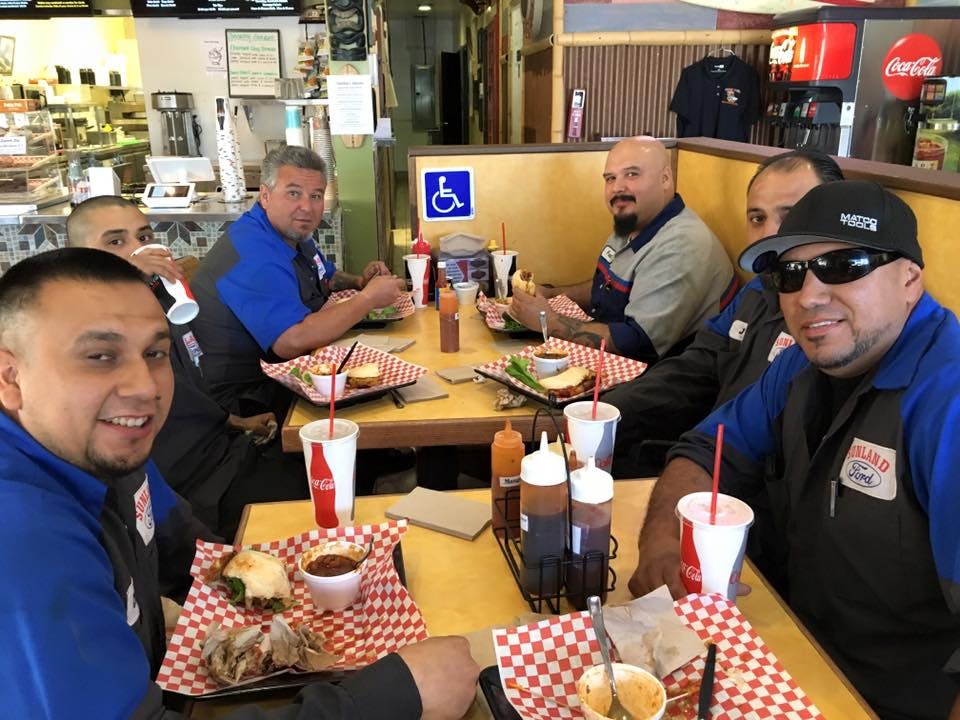 a group of people sitting at a table